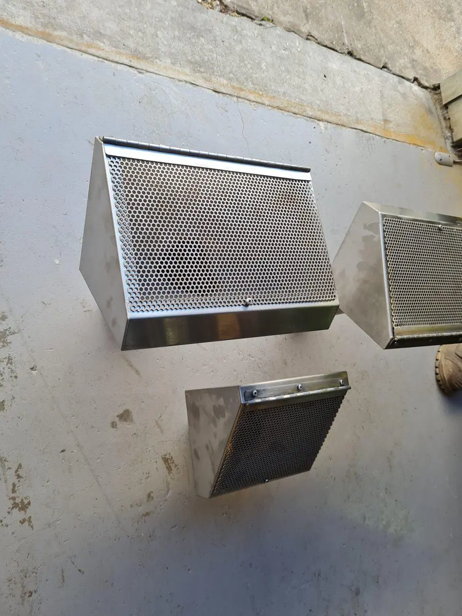 Folded perforated stainless enclosures