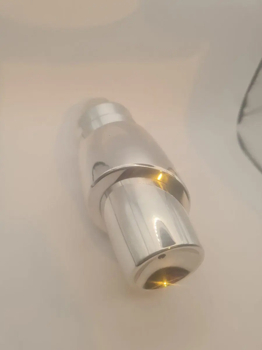 A turned stainless shaft, clean off the machine