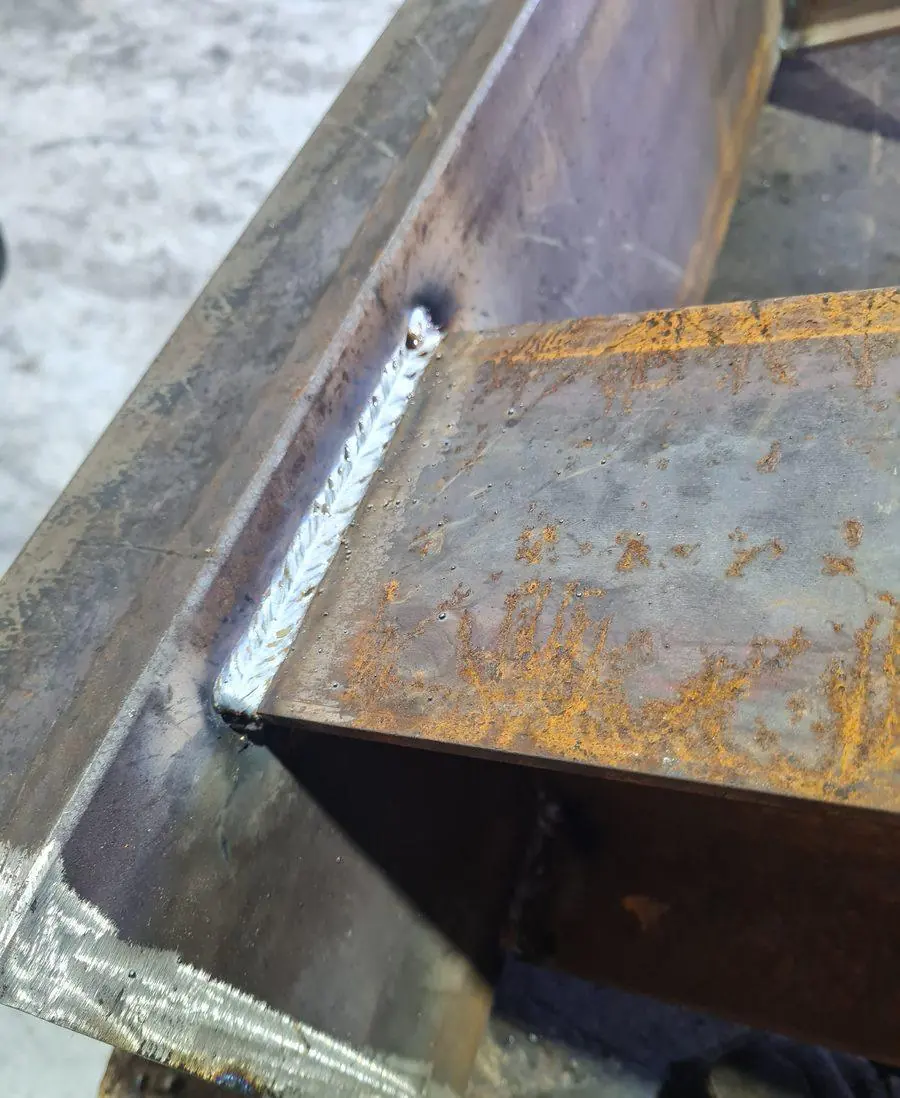 A welded steel joint dressed back and cleaned up