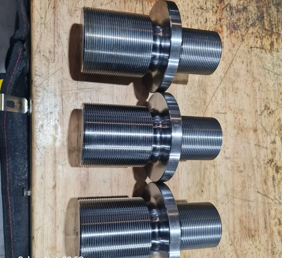 Turned and threaded steel cylinders finished to drawing